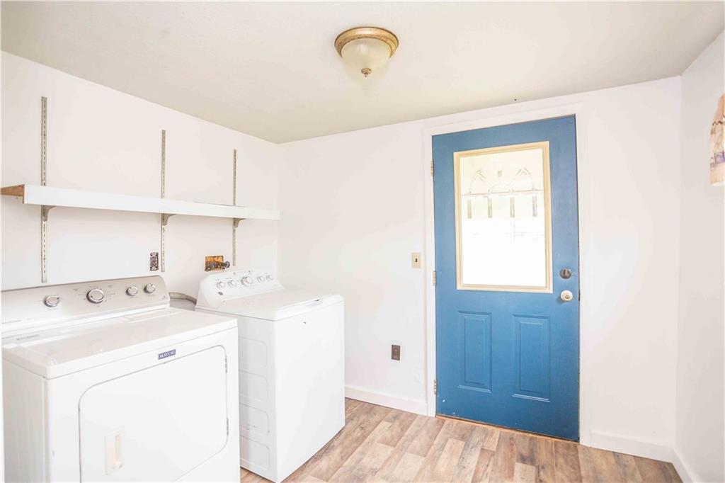 7336 Pollock Road Marion Center, PA 15759 - Photo 21 of 28 a view of cabinets a washer and dryer