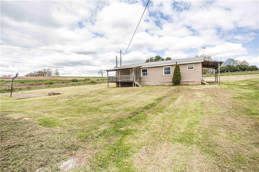 7336 Pollock Road Marion Center, PA 15759 - Photo 4 of 28 a view of an ocean with a big yard