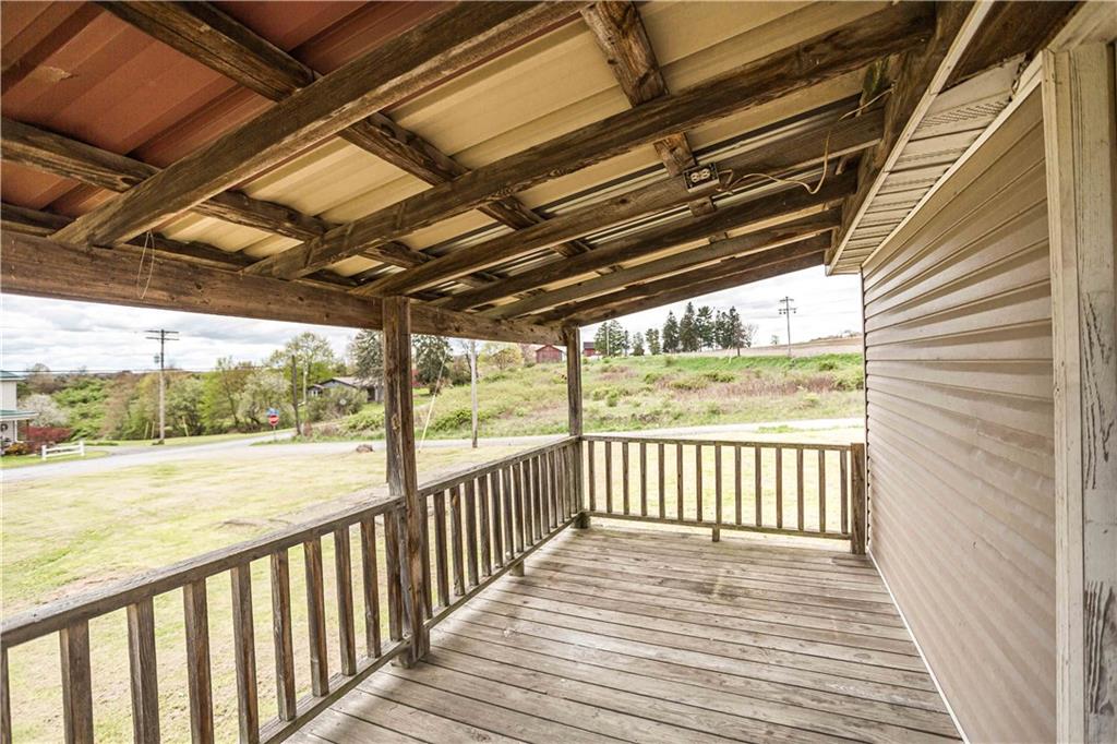 7336 Pollock Road Marion Center, PA 15759 - Photo 7 of 28 a view of a porch with wooden floor