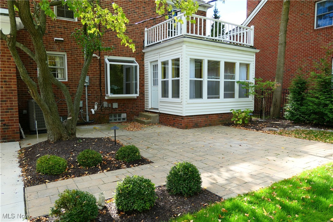 18201 Shelburne Road Cleveland, OH 44118 - Photo 33 of 36 Back of property with a patio area and a balcony