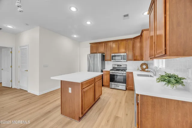 a work room with furniture and a window