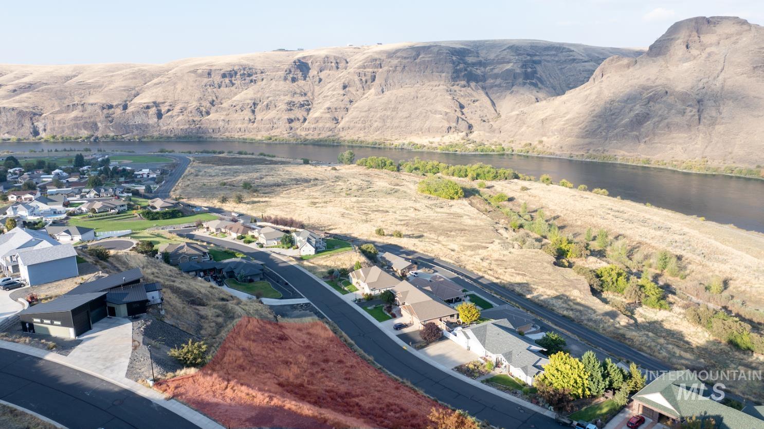 1493 River Ridge Drive Asotin, WA 99402 - Photo 3 of 14 Aerial view of residential area featuring a large body of water