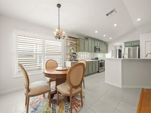 a view of a dining room with furniture