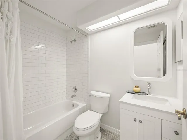 a view of a porch with chairs and backyard