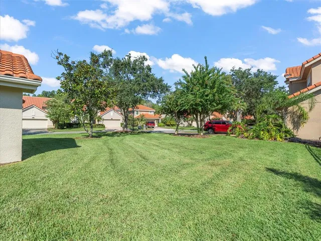 an aerial view of city and lake view