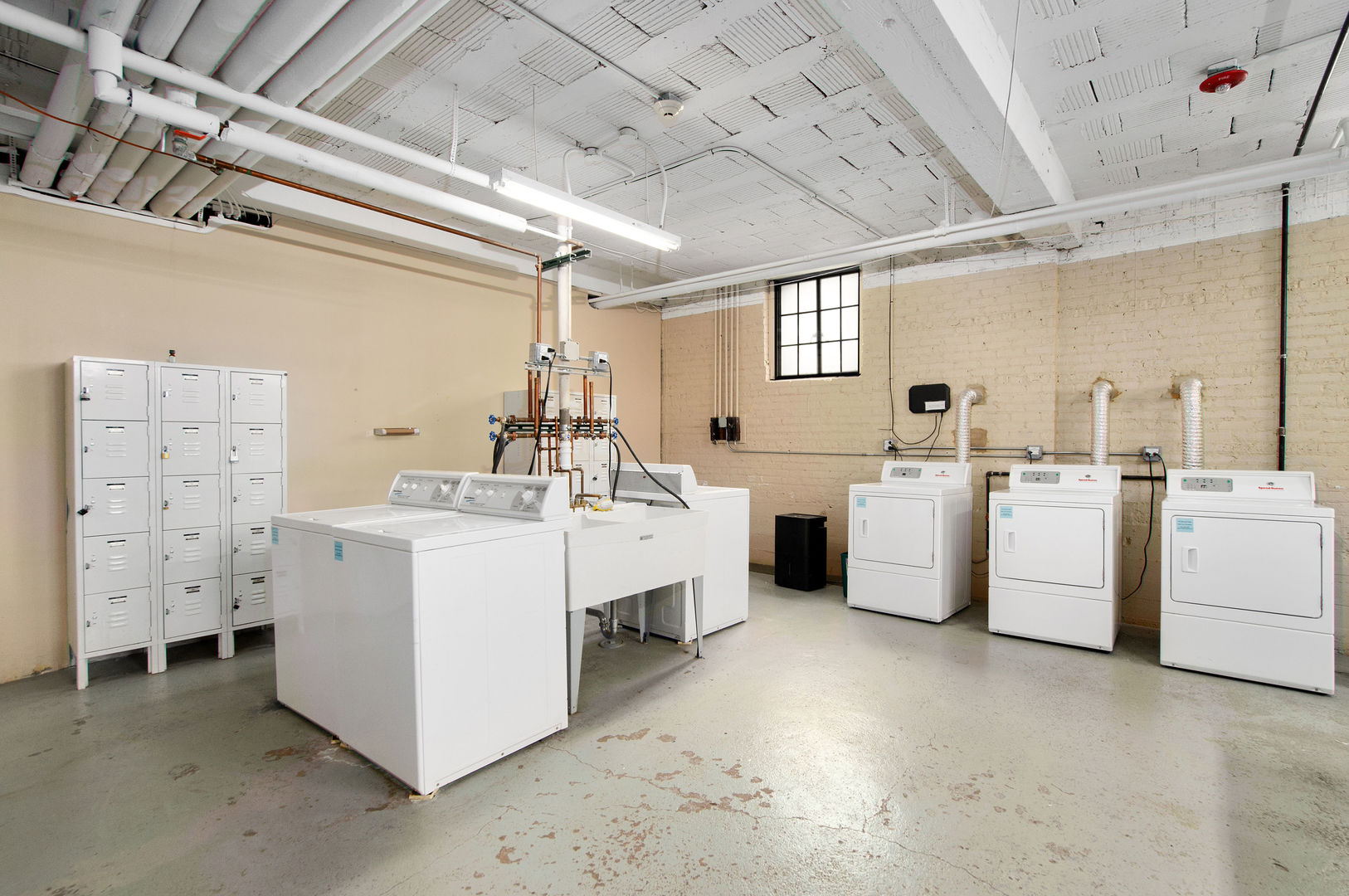 720 Noyes Street, Unit C2 Evanston, IL 60201 - Photo 11 of 14 a utility room with dryer and washer