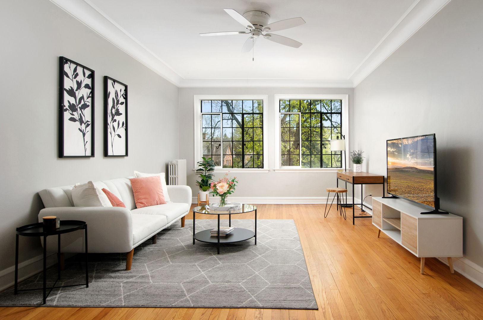 720 Noyes Street, Unit C2 Evanston, IL 60201 - Photo 3 of 14 a living room with furniture and a flat screen tv