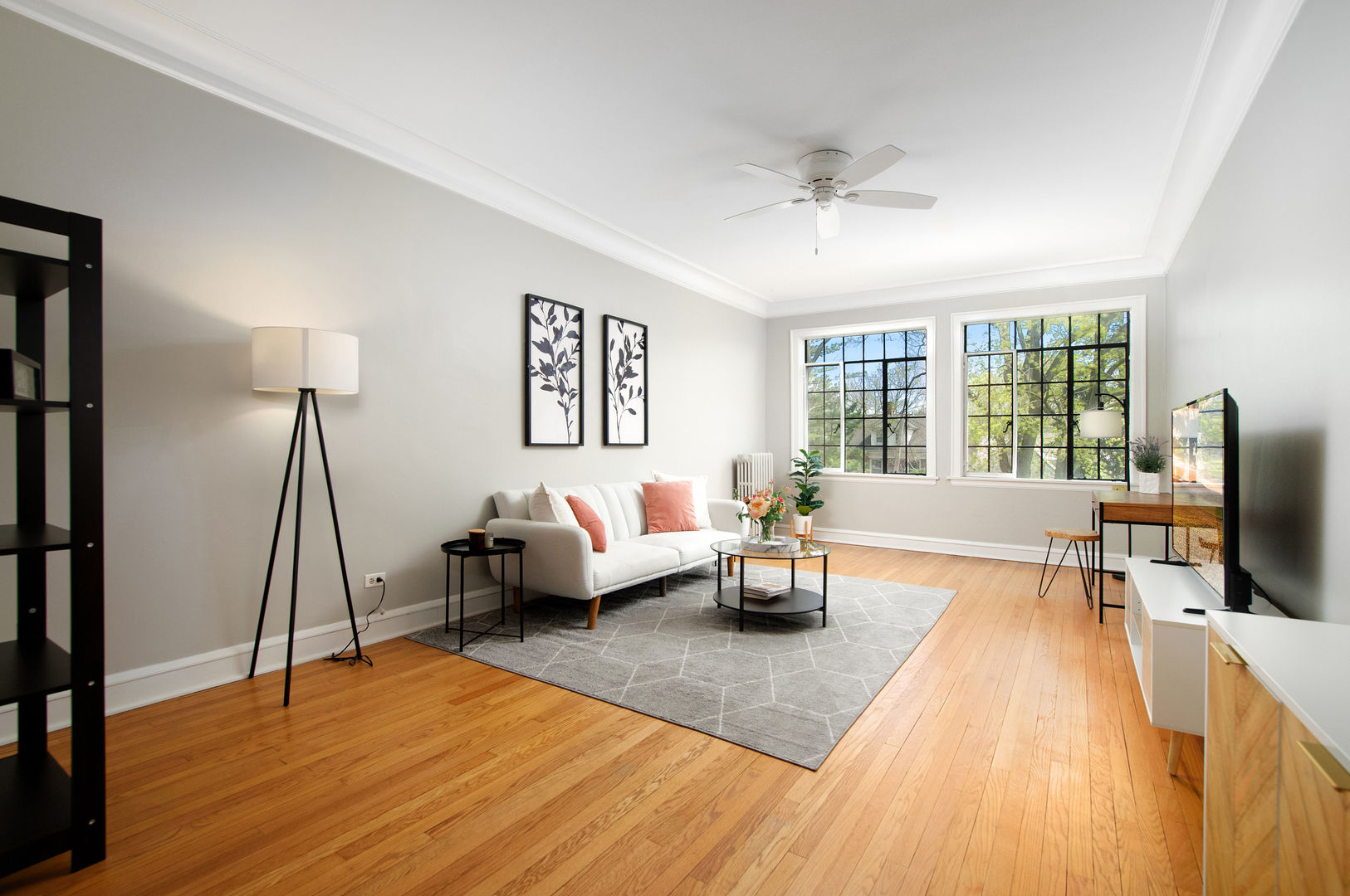 720 Noyes Street, Unit C2 Evanston, IL 60201 - Photo 4 of 14 a living room with furniture and a wooden floor