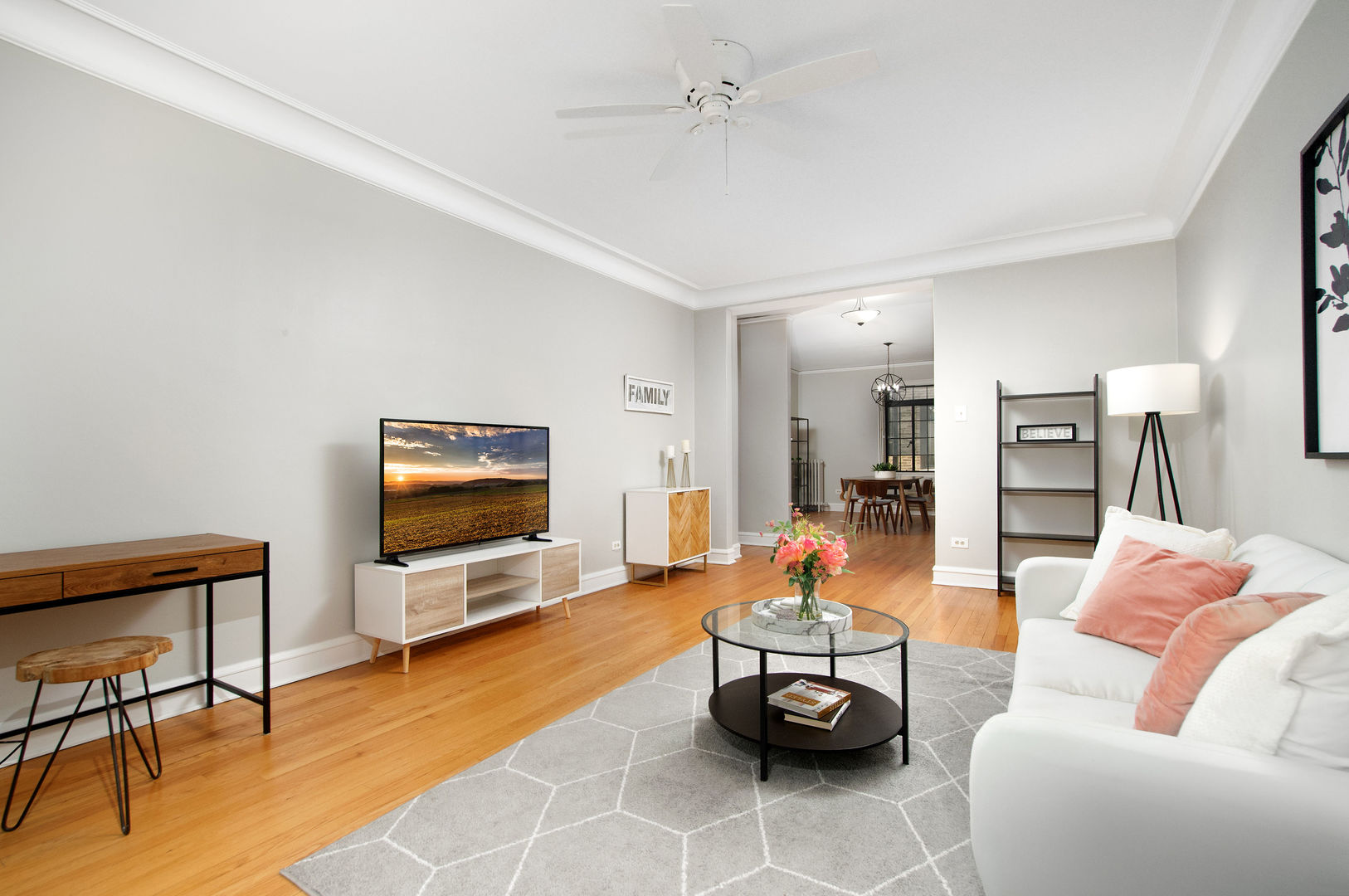720 Noyes Street, Unit C2 Evanston, IL 60201 - Photo 5 of 14 a living room with furniture and a flat screen tv