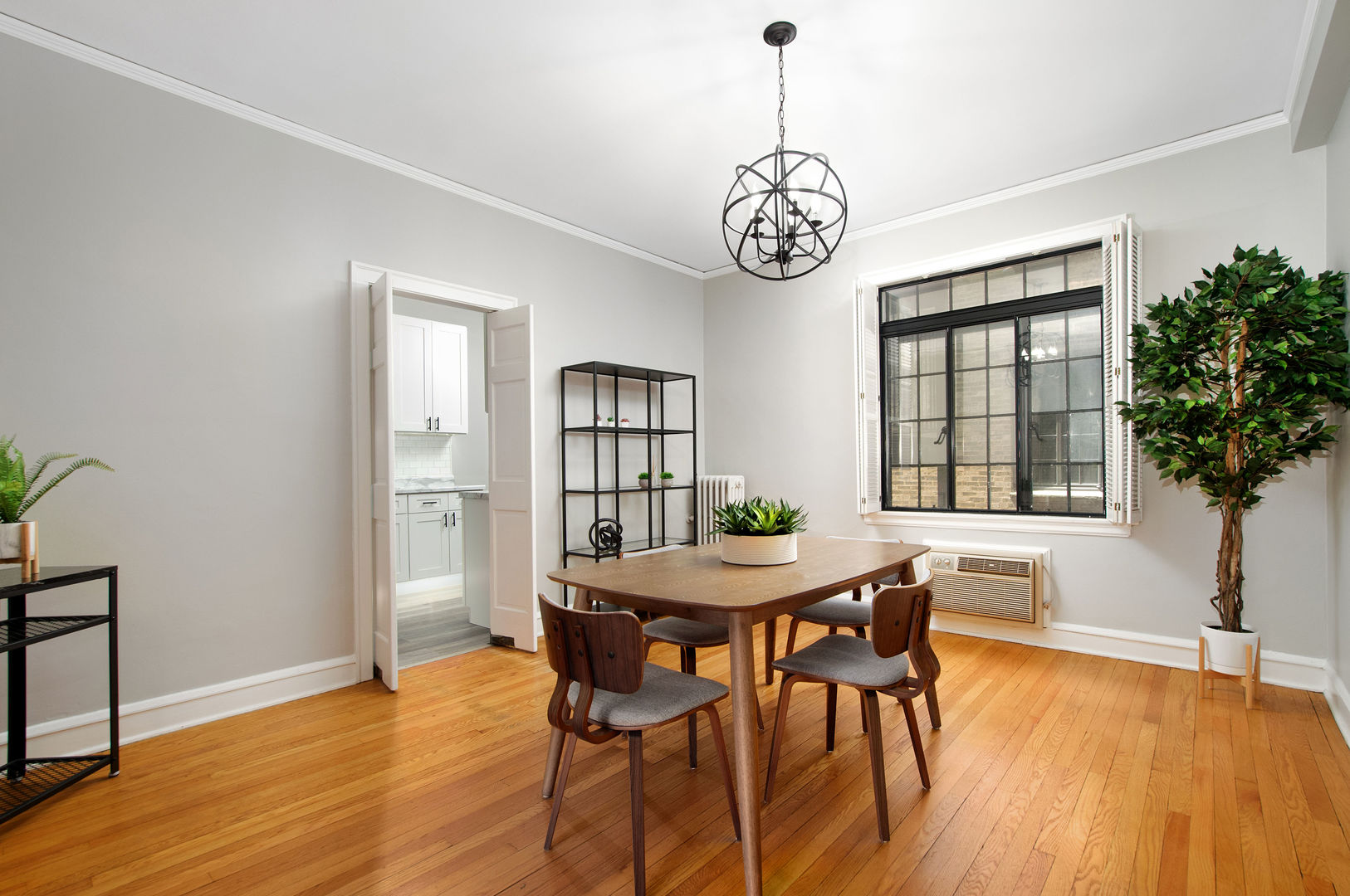 720 Noyes Street, Unit C2 Evanston, IL 60201 - Photo 6 of 14 a view of a dining room with furniture window and wooden floor