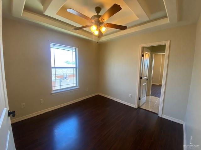 609 River Point Street Rio Grande City, TX 78582 - Photo 16 of 22 an empty room with wooden floor and windows
