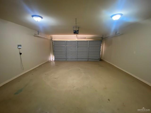 609 River Point Street Rio Grande City, TX 78582 - Photo 21 of 22 wooden floor in an empty room with a window