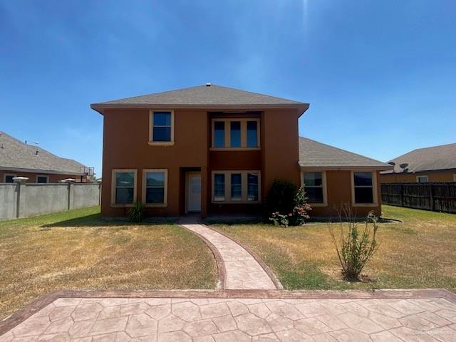 609 River Point Street Rio Grande City, TX 78582 - Photo 22 of 22 a front view of a house with a yard