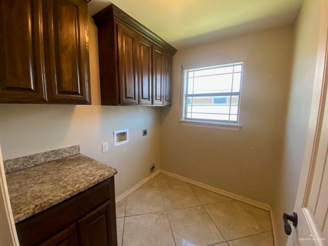 609 River Point Street Rio Grande City, TX 78582 - Photo 8 of 22 a kitchen with granite countertop cabinets and window