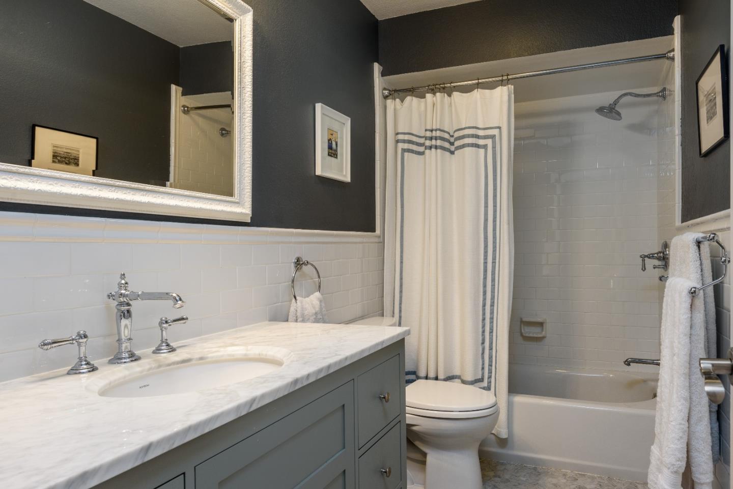 29 Pinehurst Lane Half Moon Bay, CA 94019 - Photo 11 of 17 a bathroom with a granite countertop sink toilet and shower
