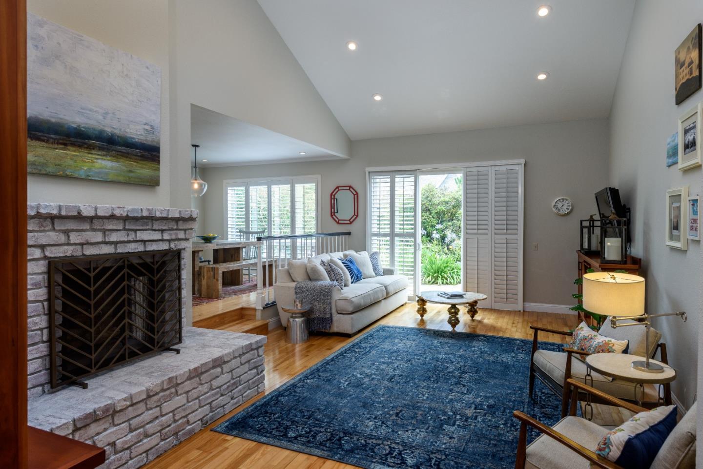 29 Pinehurst Lane Half Moon Bay, CA 94019 - Photo 3 of 17 a living room with furniture and a fireplace