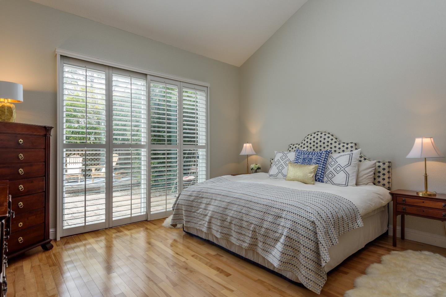 29 Pinehurst Lane Half Moon Bay, CA 94019 - Photo 7 of 17 a bedroom with a large bed and a large window