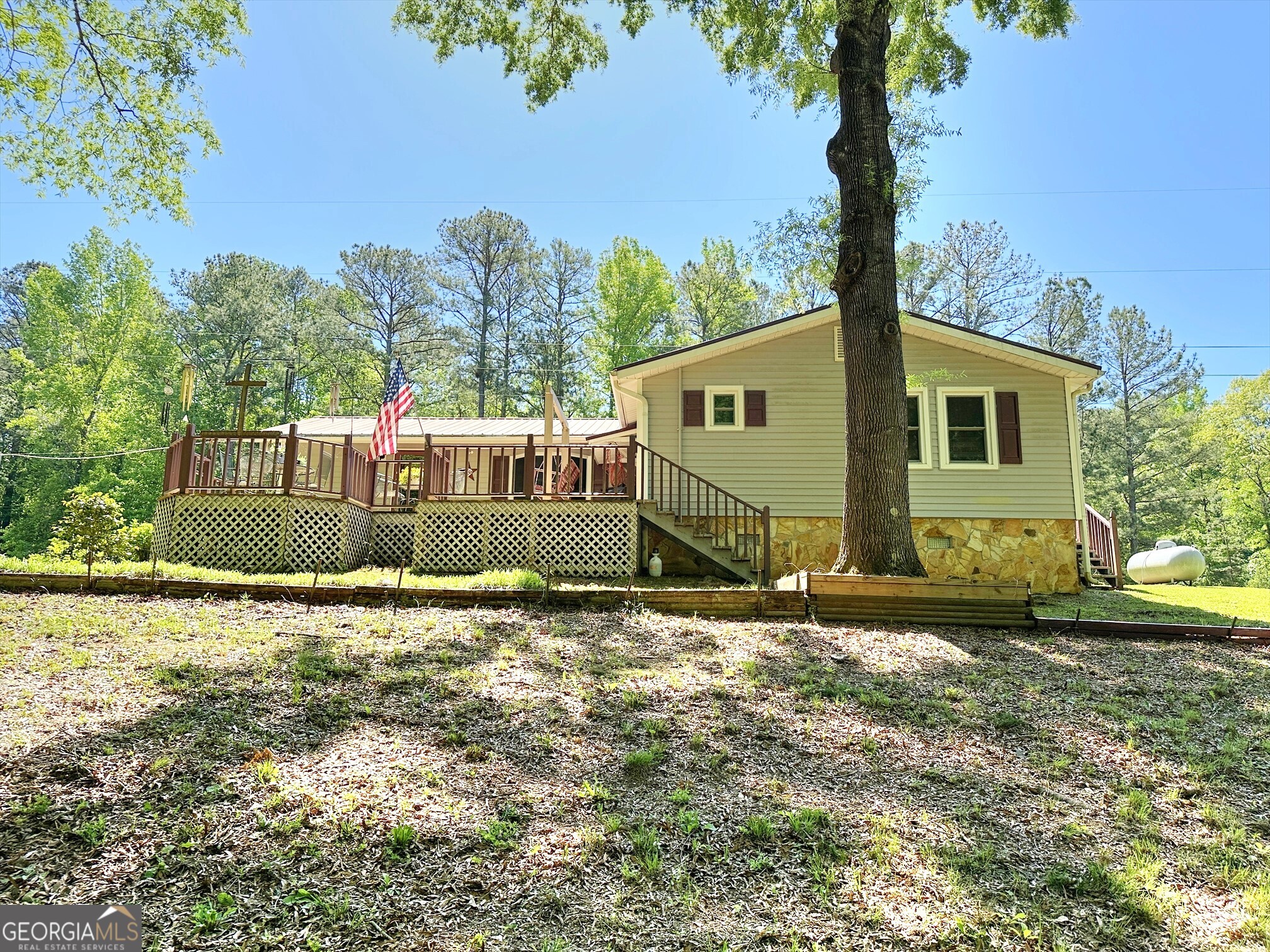 1006 Warner Road West Point, GA 31833 - Photo 1 of 1 a view of a house with backyard and tree