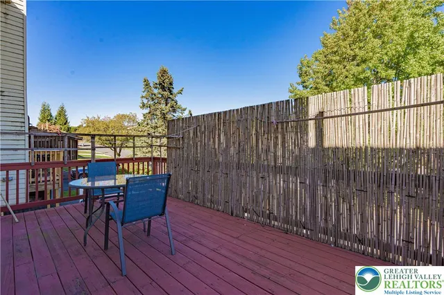 a view of a chairs on the roof deck