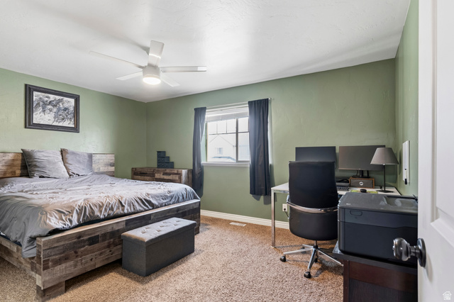 1165 West 100 South Springville, UT 84663 - Photo 25 of 28 Bedroom featuring carpet floors, ceiling fan, and an office area