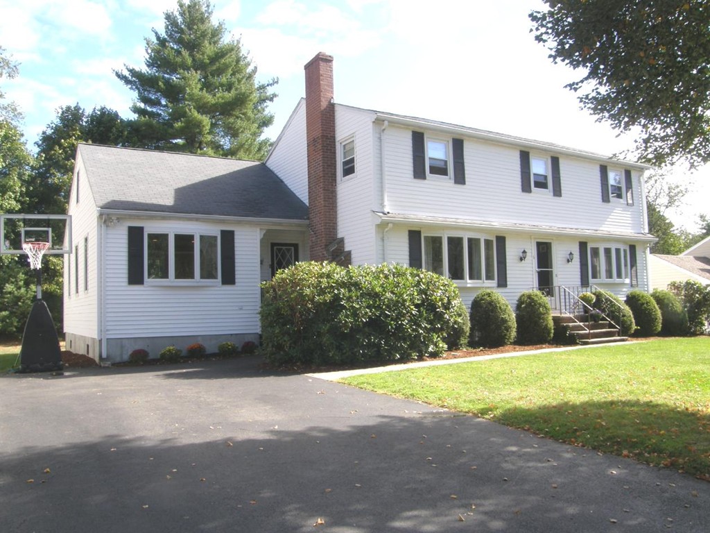 6 Kingsbury Road Canton, MA 02021 - Photo 1 of 26 a view of a house with a yard