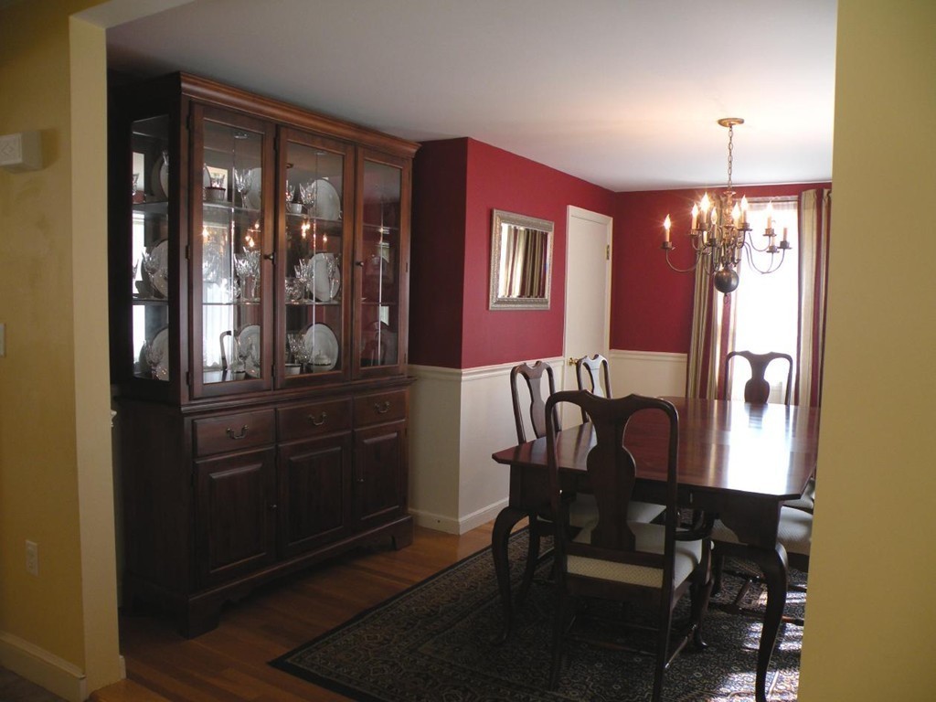 6 Kingsbury Road Canton, MA 02021 - Photo 13 of 26 a view of a dining room with furniture and chandelier