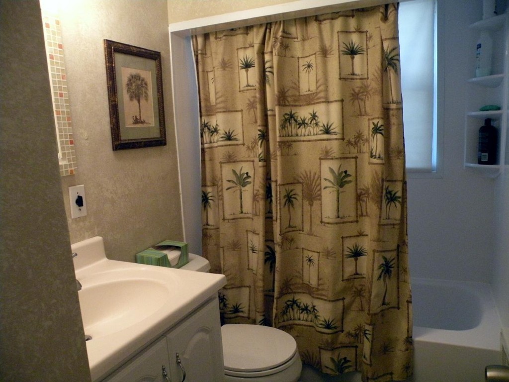 6 Kingsbury Road Canton, MA 02021 - Photo 14 of 26 a bathroom with a sink a toilet and shower