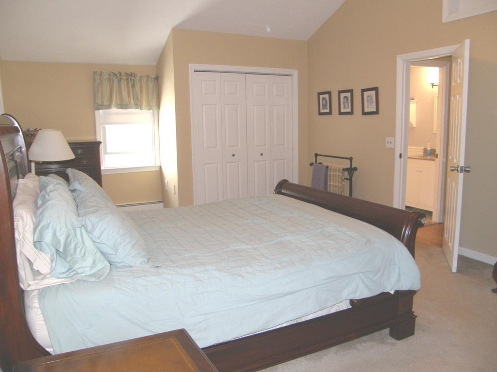 6 Kingsbury Road Canton, MA 02021 - Photo 15 of 26 a bedroom with a bed and window