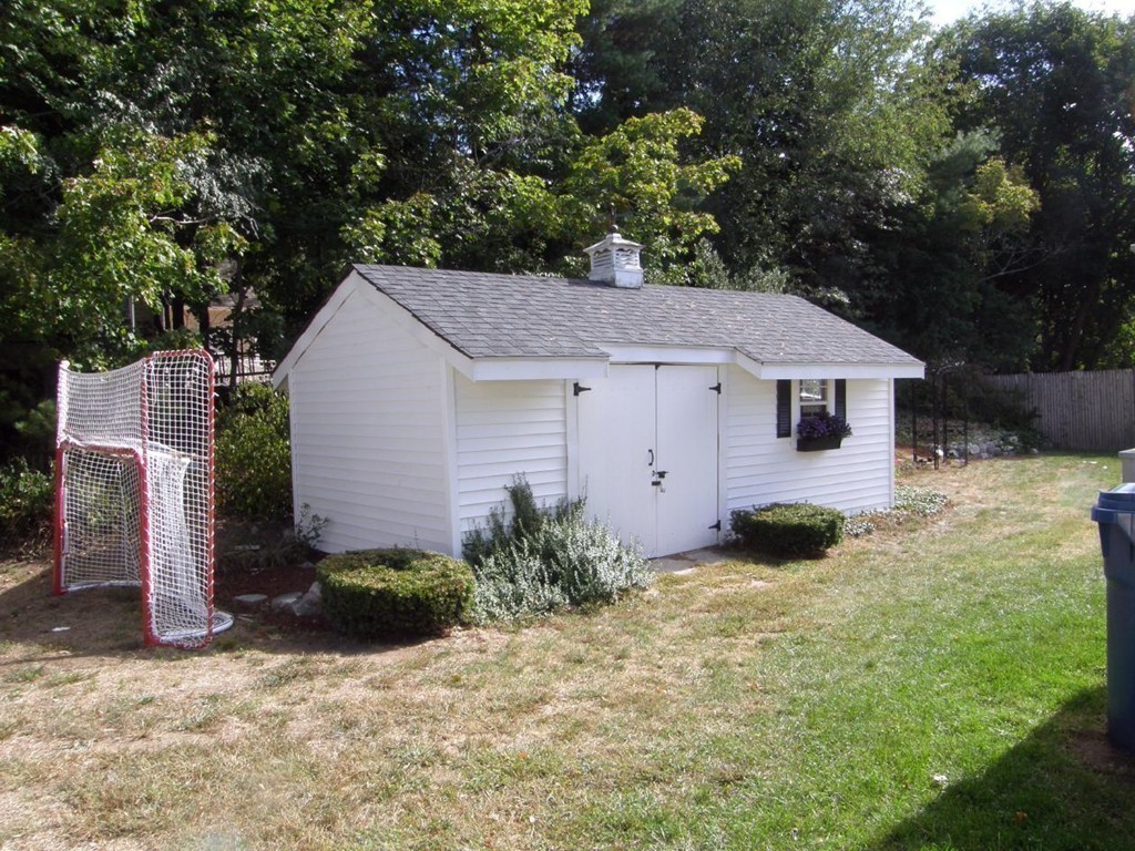 6 Kingsbury Road Canton, MA 02021 - Photo 26 of 26 a view of a house with a yard and large tree
