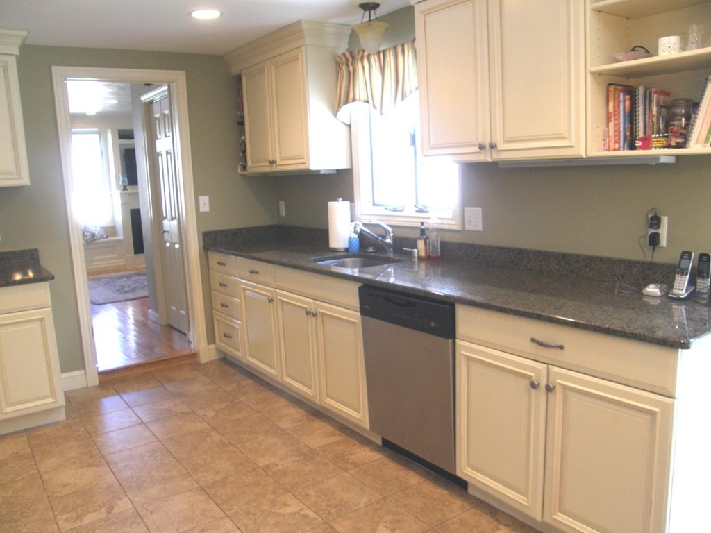 6 Kingsbury Road Canton, MA 02021 - Photo 3 of 26 a kitchen with granite countertop a sink and cabinets