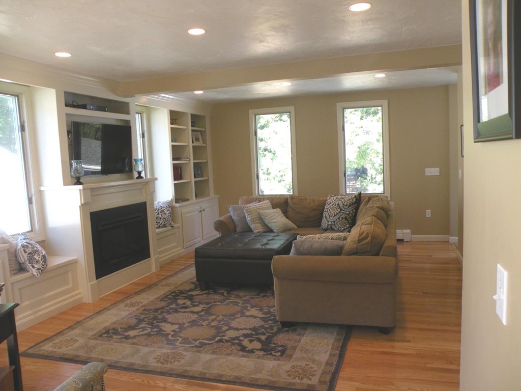 6 Kingsbury Road Canton, MA 02021 - Photo 5 of 26 a living room with furniture and a fireplace
