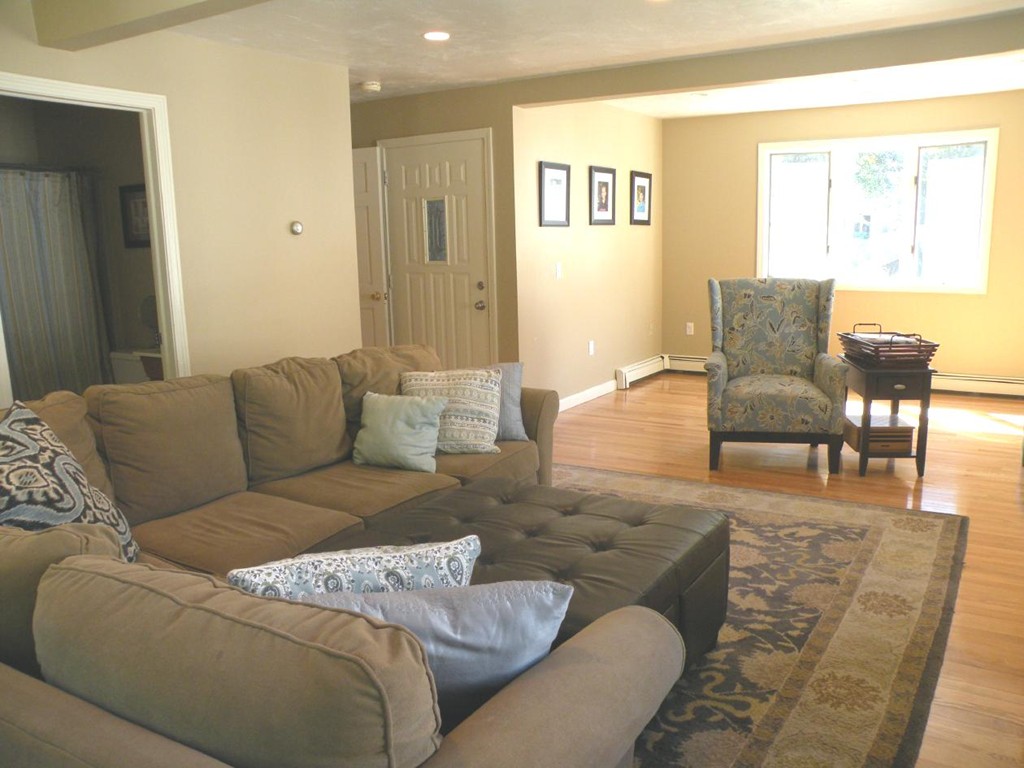 6 Kingsbury Road Canton, MA 02021 - Photo 6 of 26 a living room with furniture and a couch