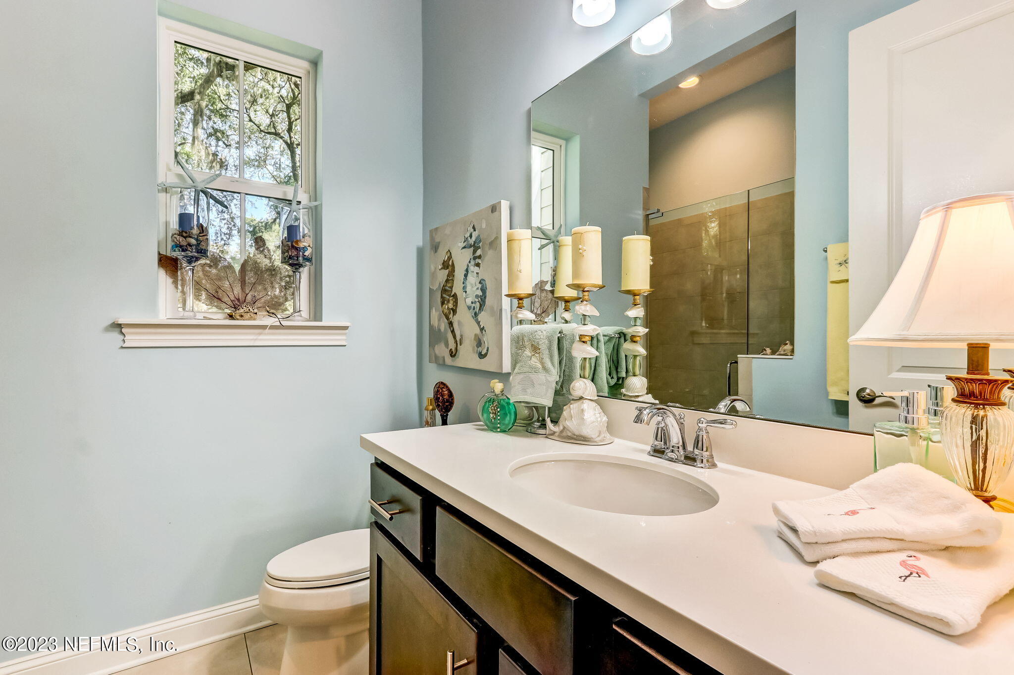28951 Grandview Manor Yulee, FL 32097 - Photo 11 of 35 a bathroom with a sink and a mirror