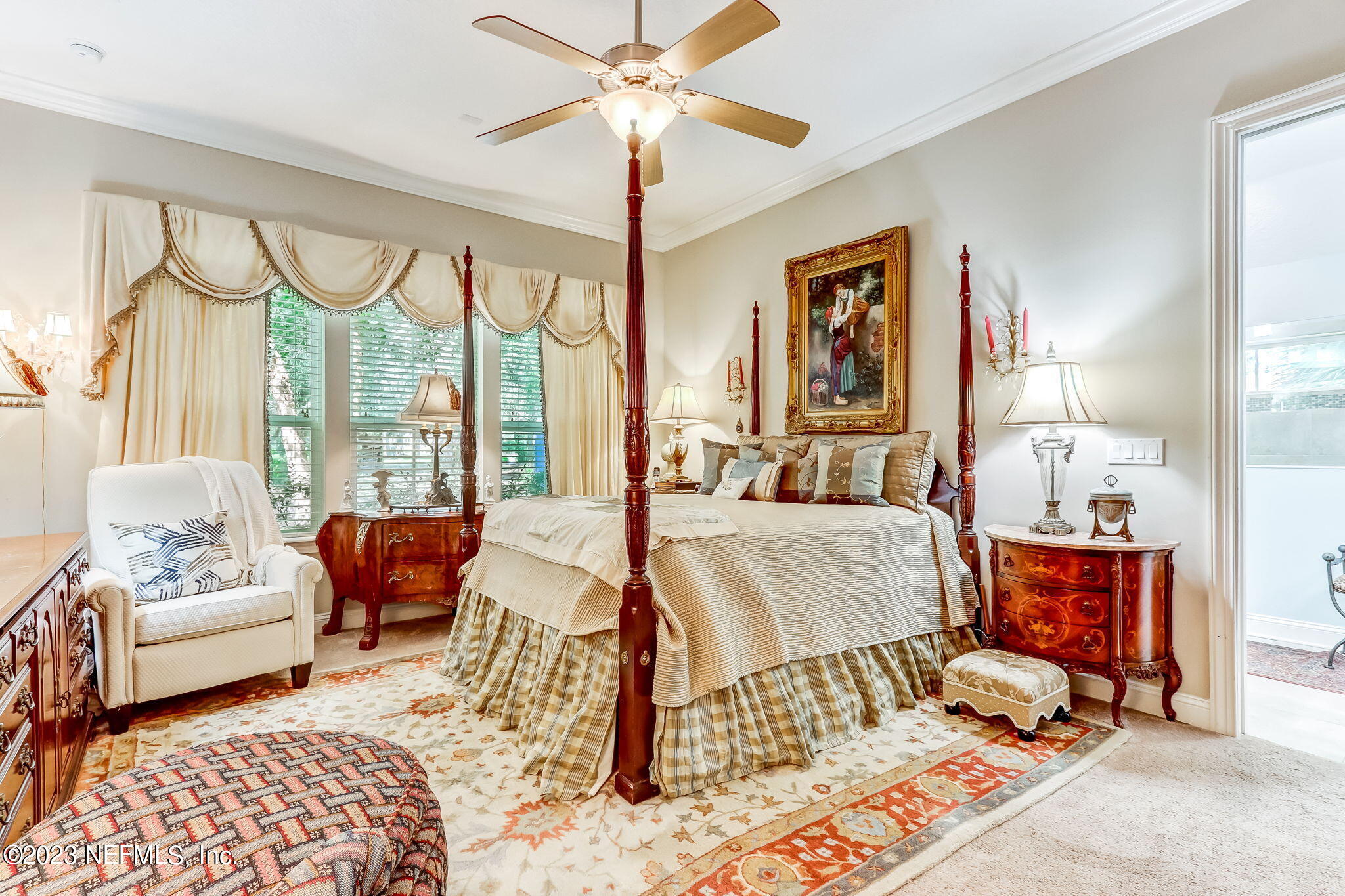 28951 Grandview Manor Yulee, FL 32097 - Photo 12 of 35 a bedroom with a bed and a couch