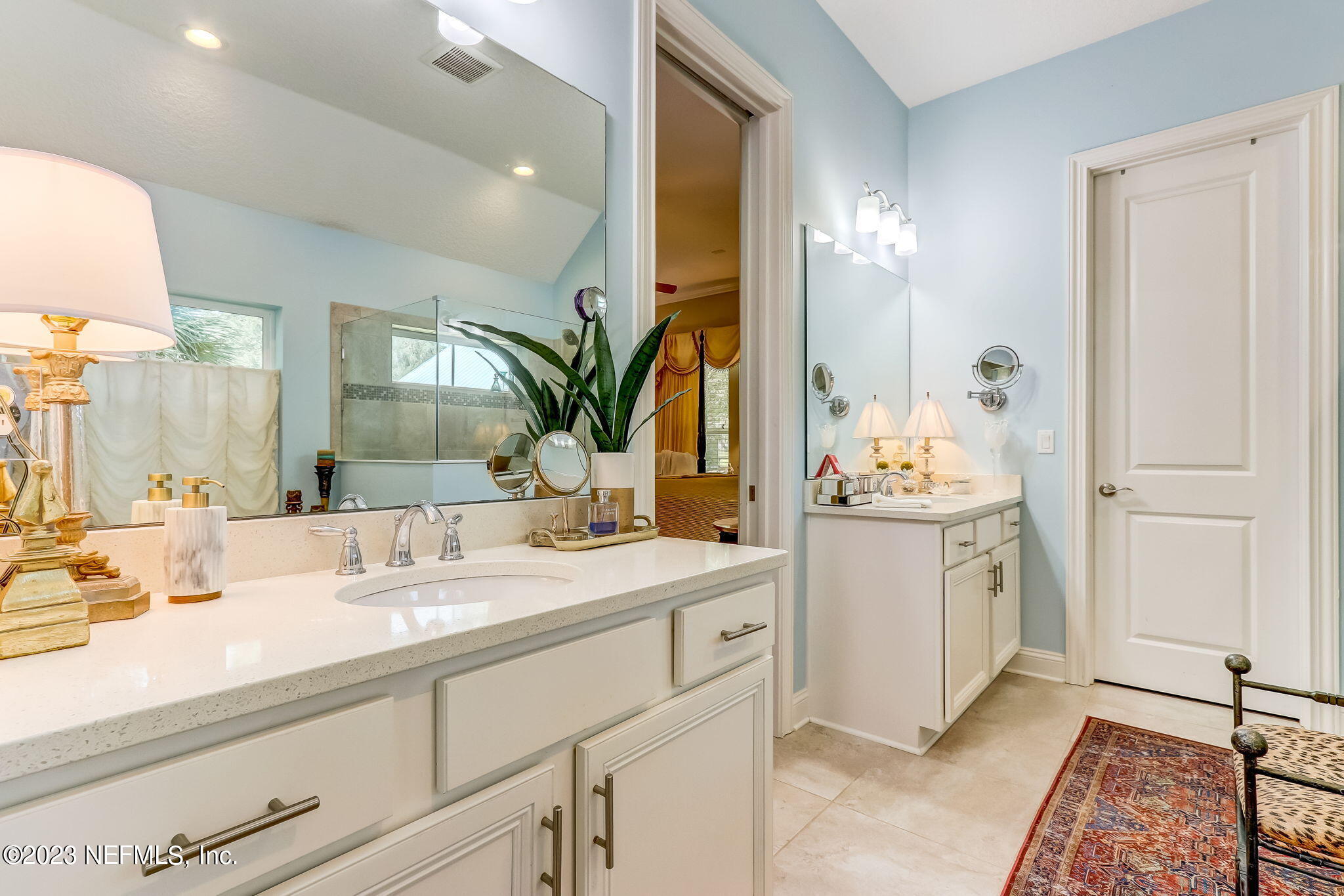 28951 Grandview Manor Yulee, FL 32097 - Photo 13 of 35 a bathroom with a sink and a mirror