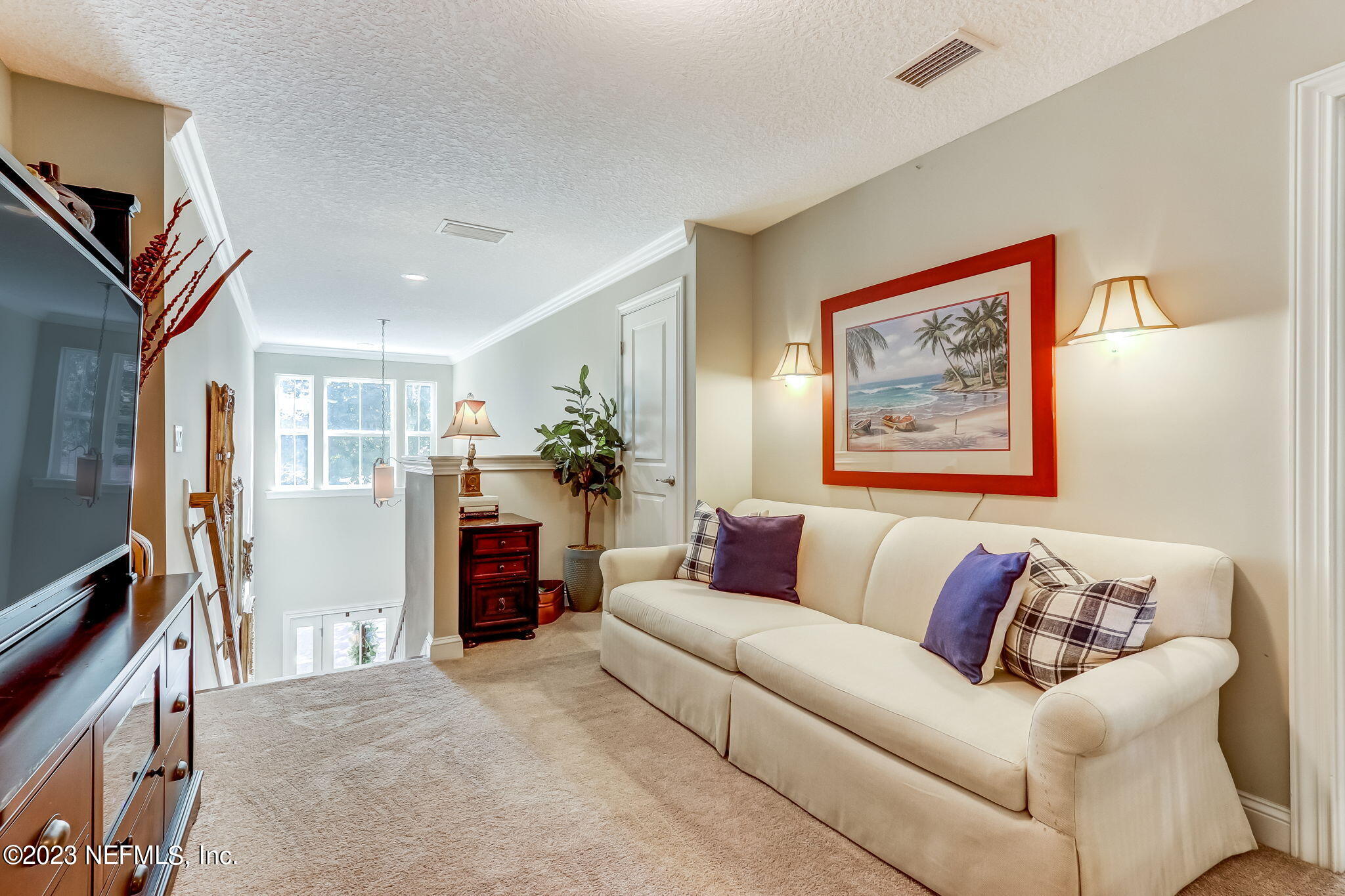 28951 Grandview Manor Yulee, FL 32097 - Photo 15 of 35 a living room with furniture and a fireplace