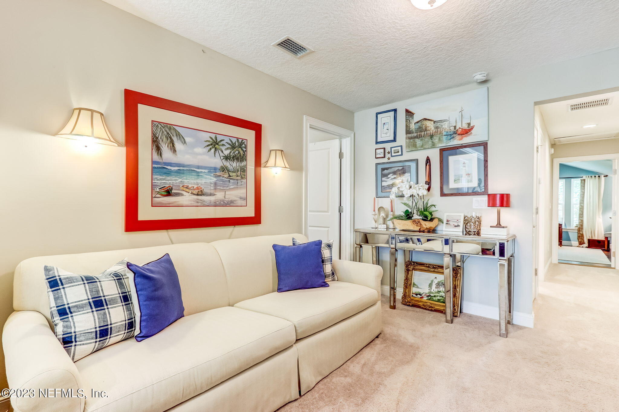 28951 Grandview Manor Yulee, FL 32097 - Photo 17 of 35 a living room with furniture and painting on the wall