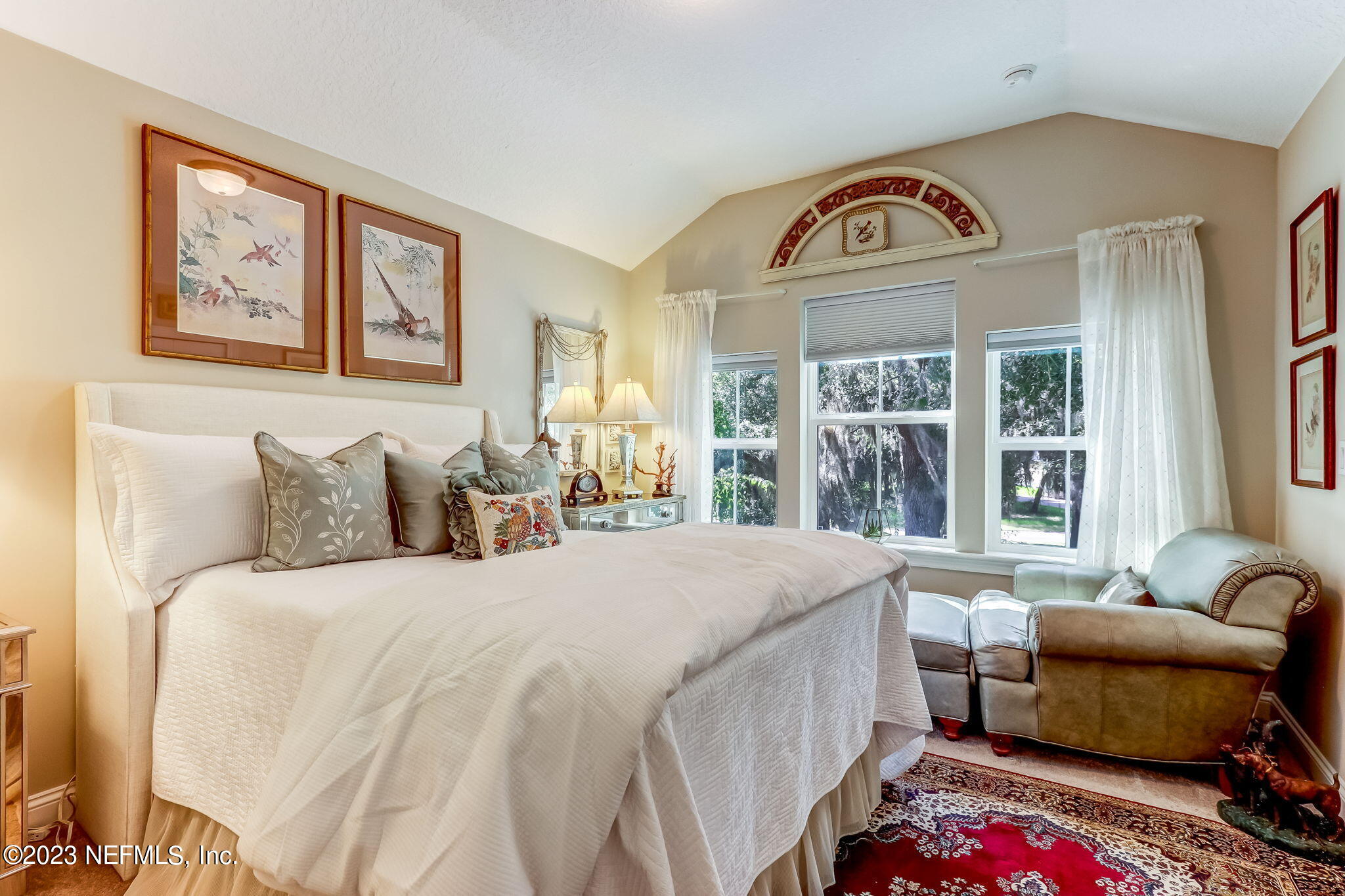 28951 Grandview Manor Yulee, FL 32097 - Photo 18 of 35 a bedroom with a bed and a large window