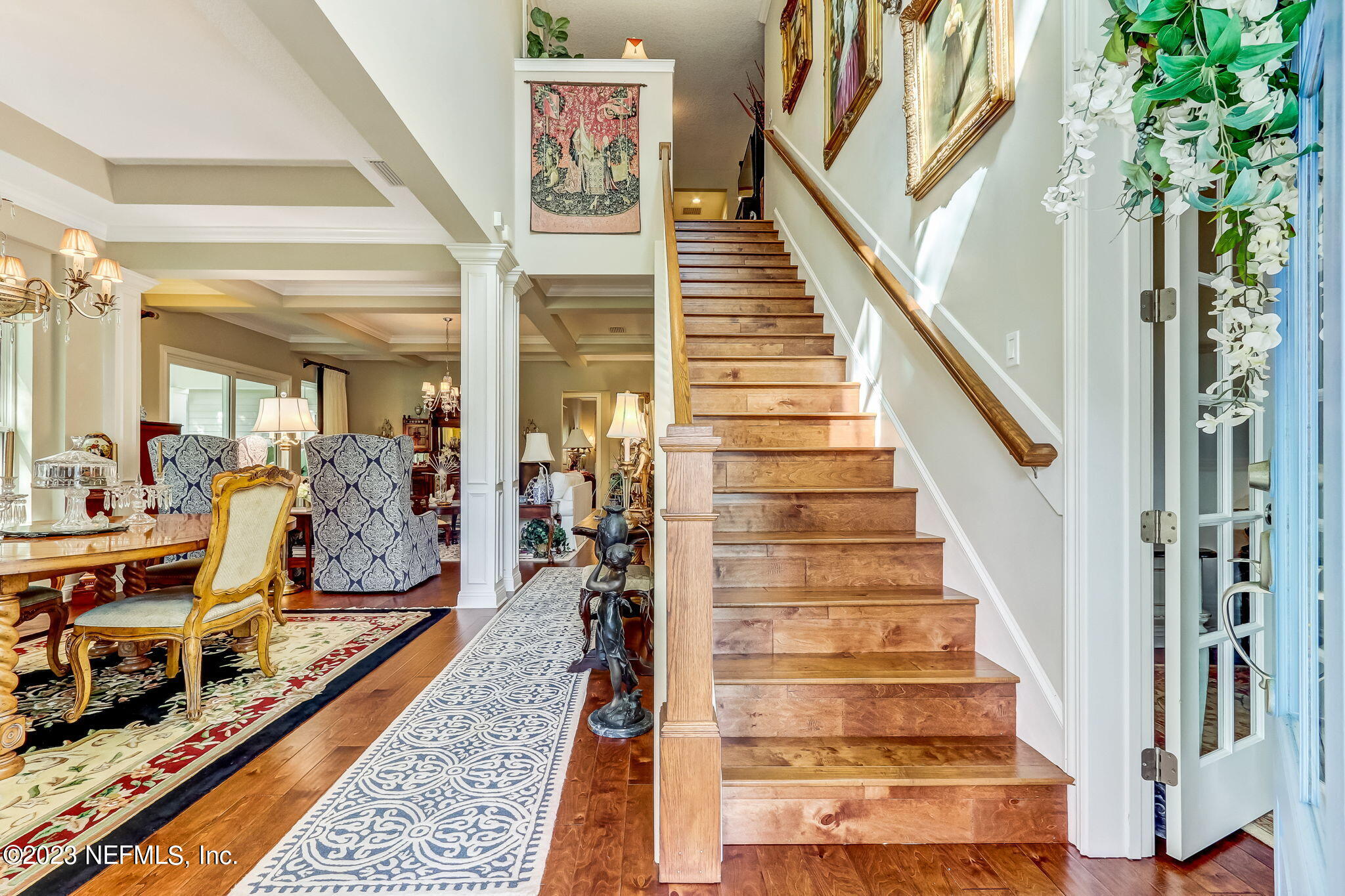 28951 Grandview Manor Yulee, FL 32097 - Photo 2 of 35 a view of staircase with wooden floor and a rug