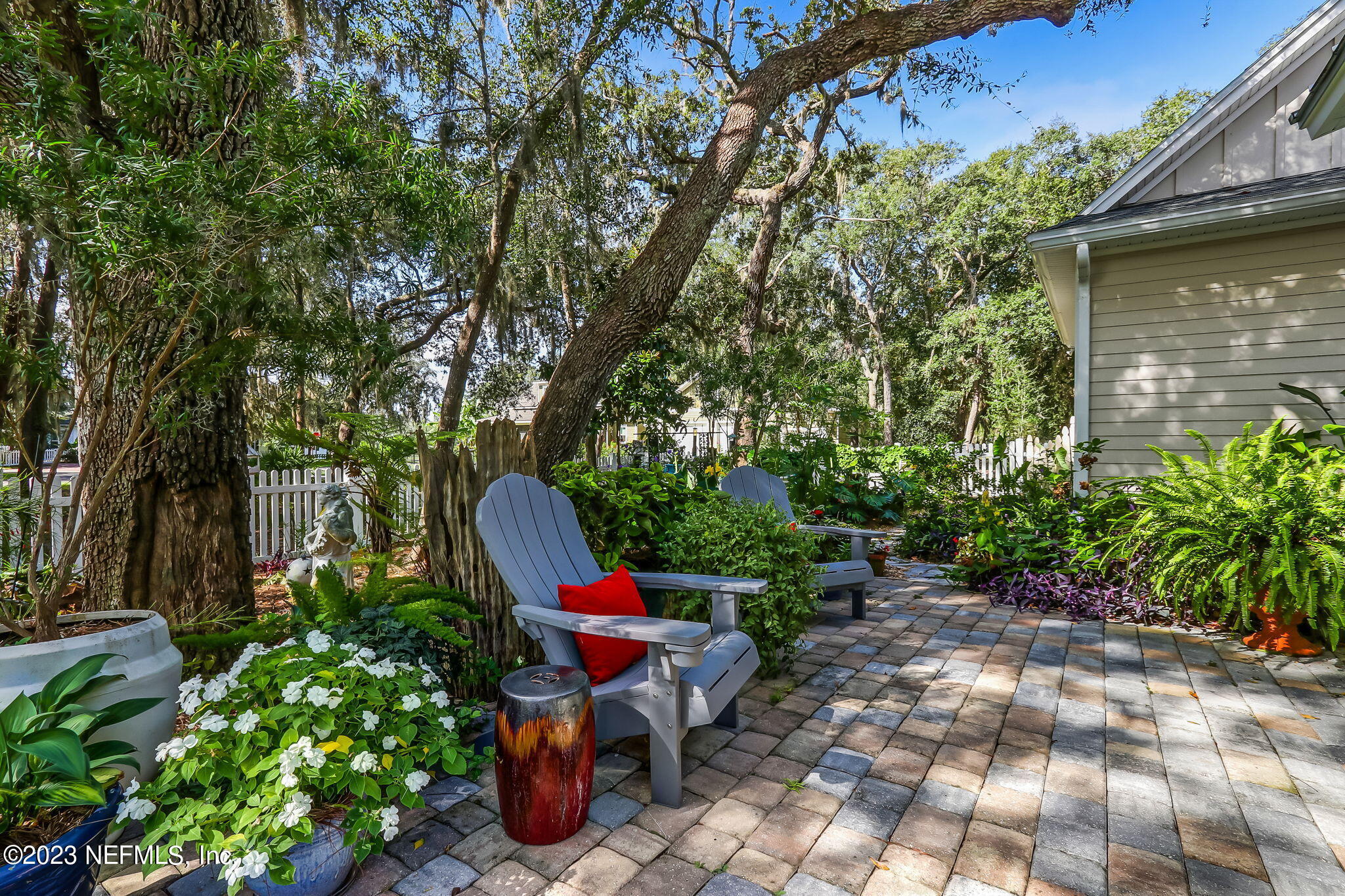 28951 Grandview Manor Yulee, FL 32097 - Photo 27 of 35 a view of a chairs and fire pit in a backyard