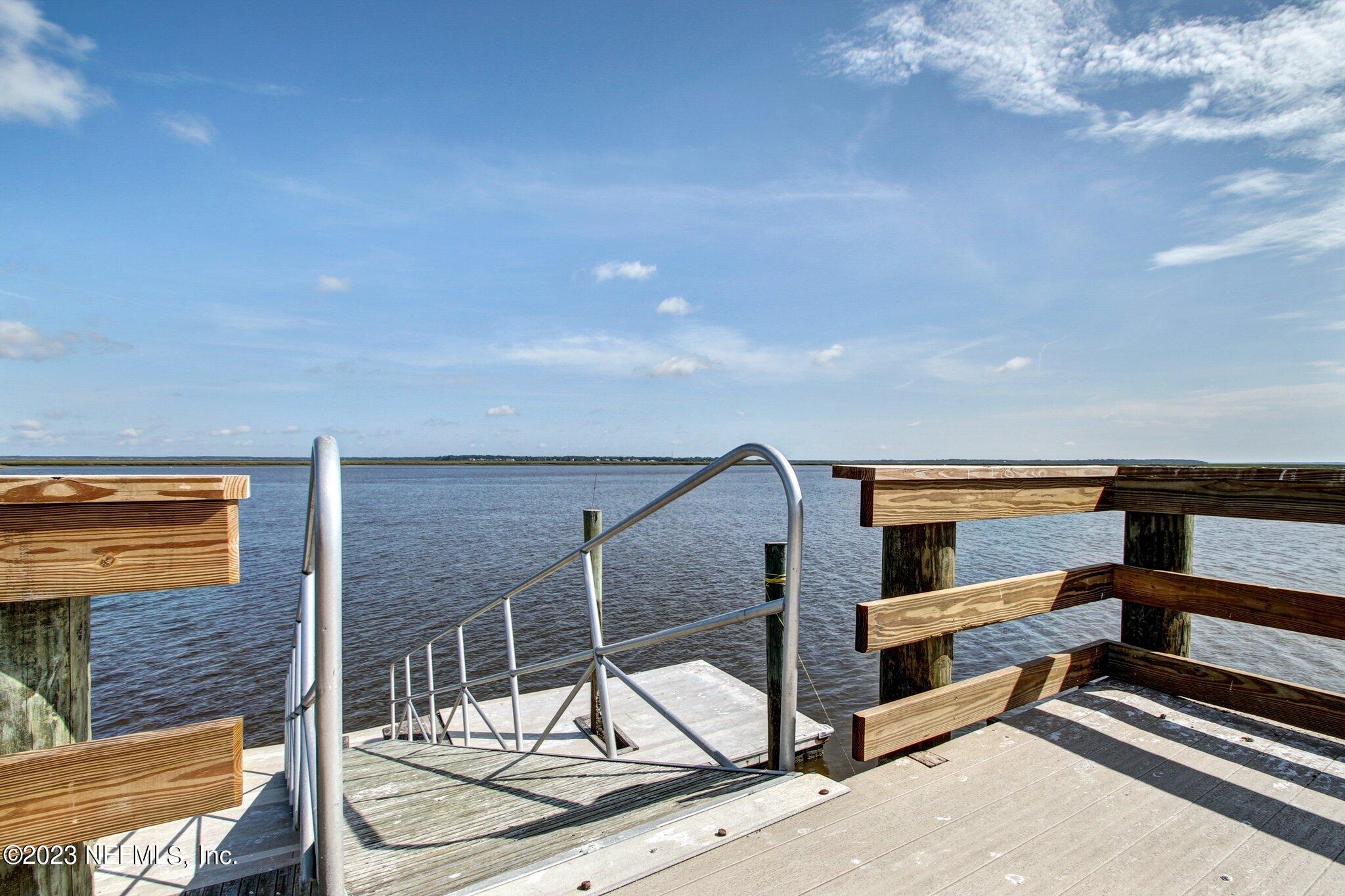 28951 Grandview Manor Yulee, FL 32097 - Photo 34 of 35 a swimming pool with chairs