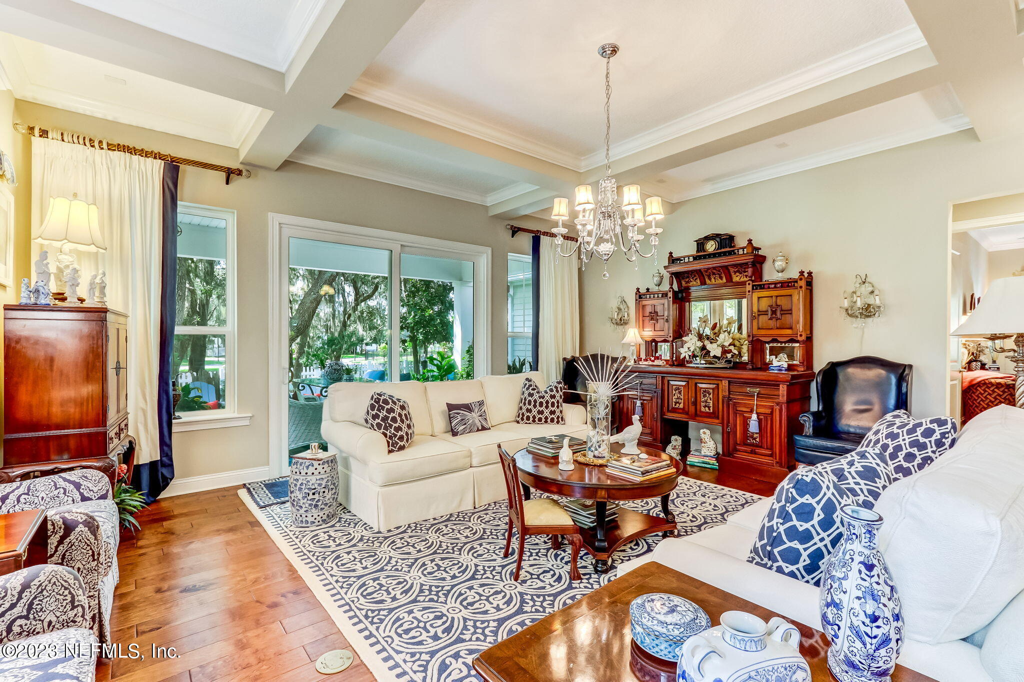 28951 Grandview Manor Yulee, FL 32097 - Photo 6 of 35 a living room with fireplace furniture and a flat screen tv