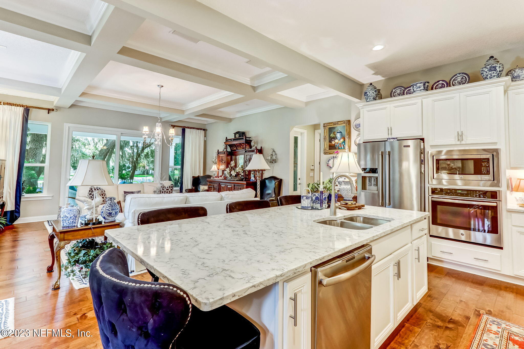 28951 Grandview Manor Yulee, FL 32097 - Photo 9 of 35 a open kitchen with stainless steel appliances granite countertop a stove and refrigerator