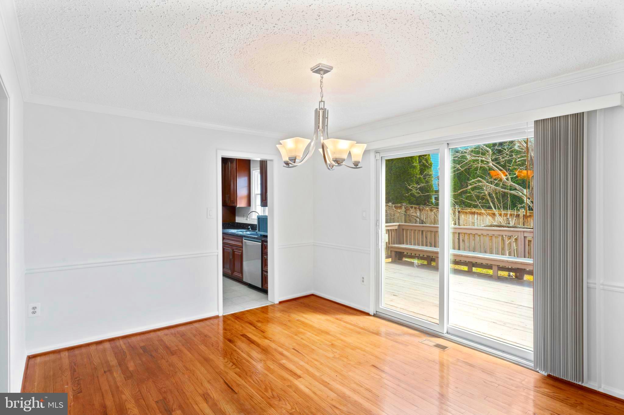 9 Coachlamp Court Silver Spring, MD 20906 - Photo 16 of 85 Dining room with Slider Doors to Deck