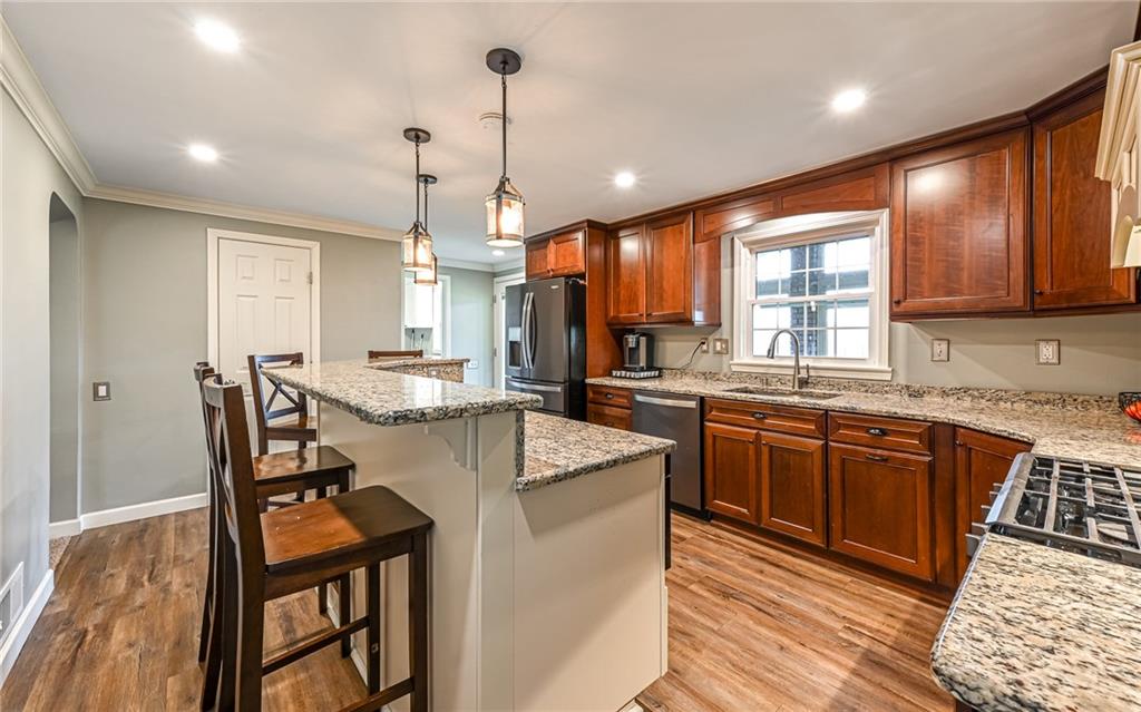 27 Kaufman Road Gibsonia, PA 15044 - Photo 15 of 41 Angled Island allows for additional food preparation, serving and casual dining