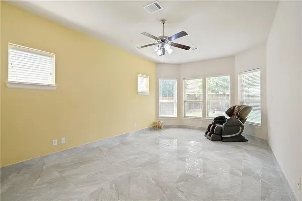 a view of a hallway with entryway and front door