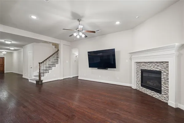 a kitchen with stainless steel appliances granite countertop a sink a stove and a microwave