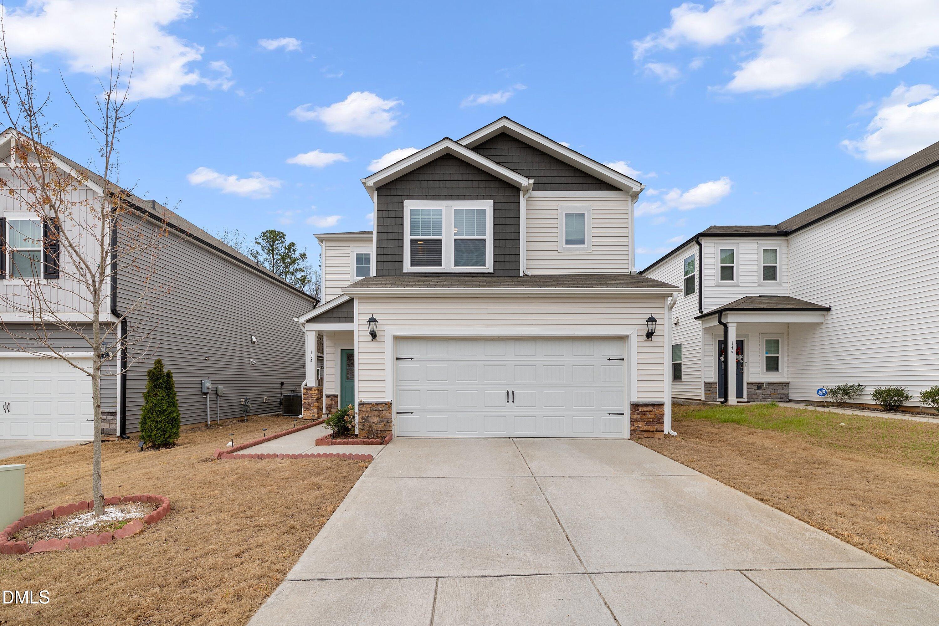 154 Anise Tree Way Clayton, NC 27527 - Photo 3 of 43 a view of a house with a patio