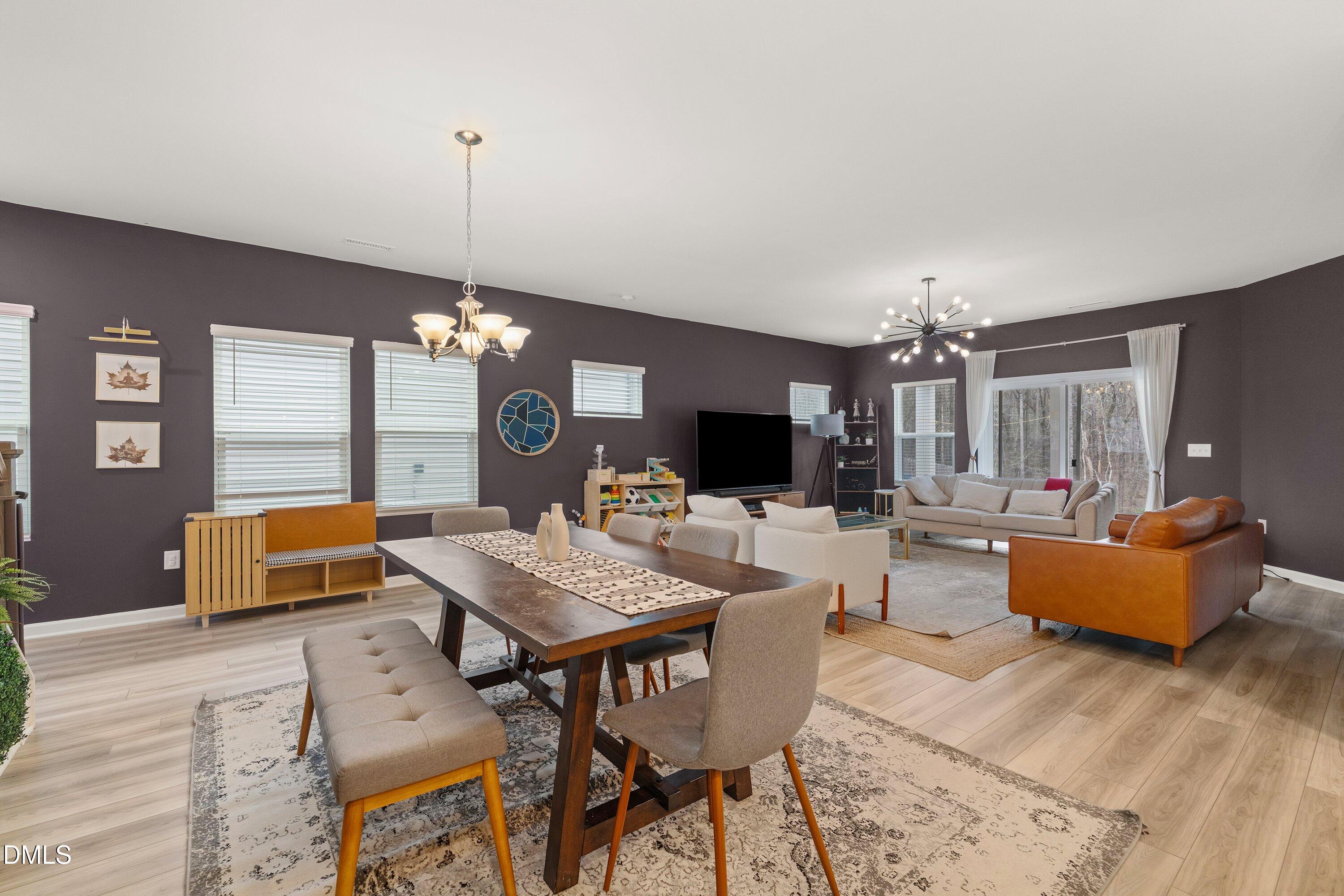 154 Anise Tree Way Clayton, NC 27527 - Photo 7 of 43 a view of a livingroom and dining room
