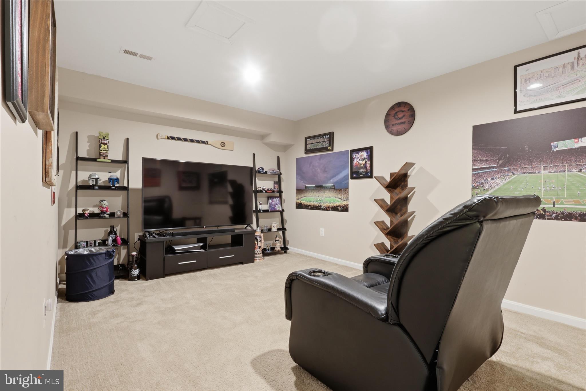 305 Tiger Way Boonsboro, MD 21713 - Photo 55 of 79 a living room with furniture and a flat screen tv